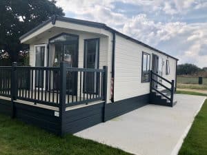 Heron 35 x 13ft – End Of Season Stock Clearance – Reduced to £79,995 Sited with Skirting & Front Decking!