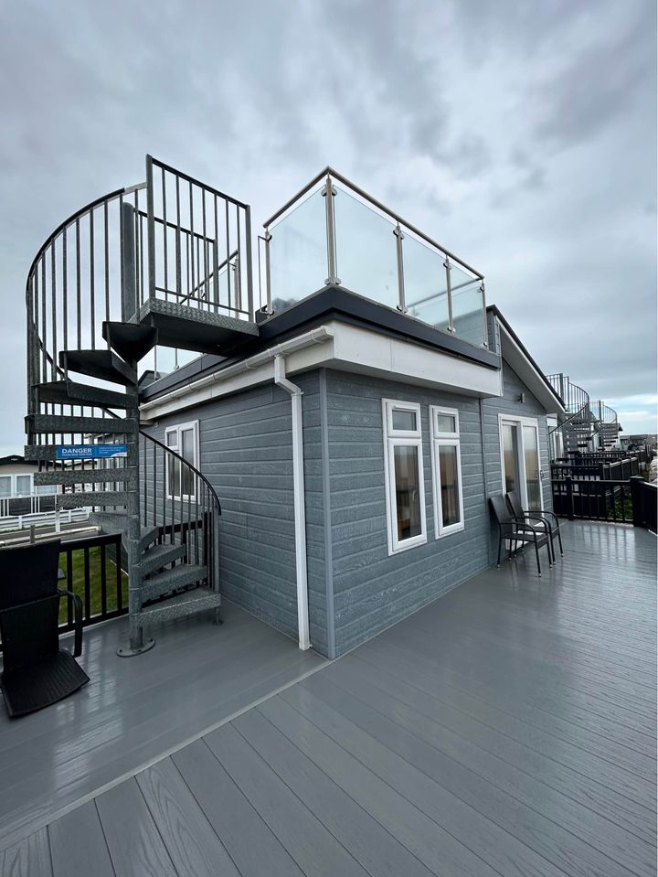 Preview of the first image of unique-lodge-on-the-seafront-roof-top-lounge.